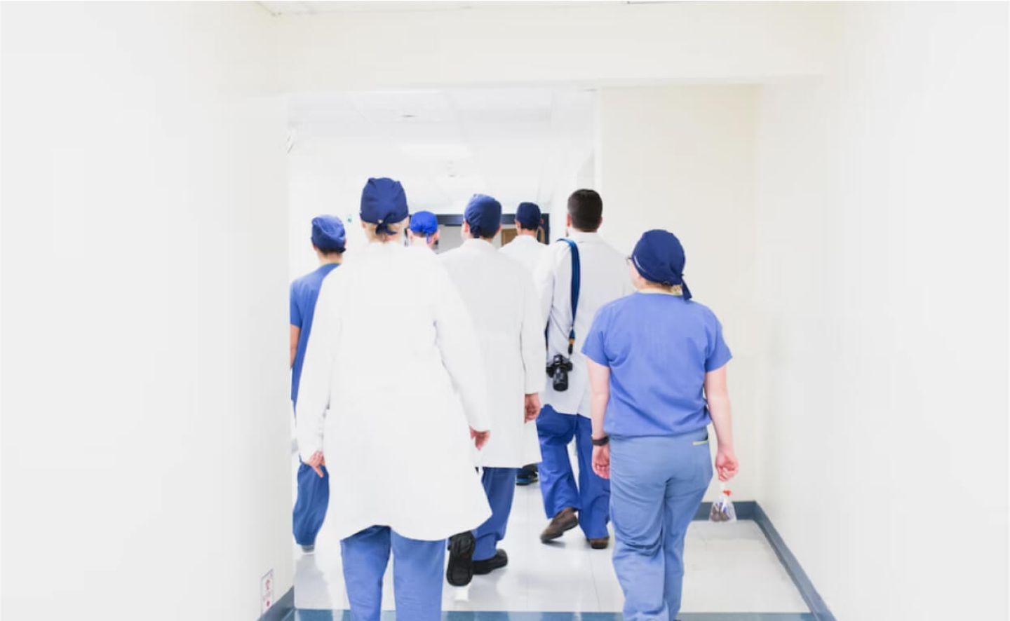 Group of doctor going to work in uniform
